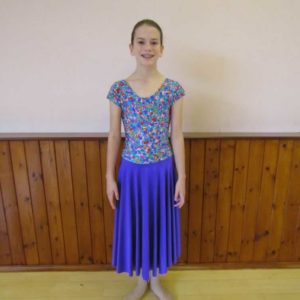 Floral print top with attached purple lycra skirt